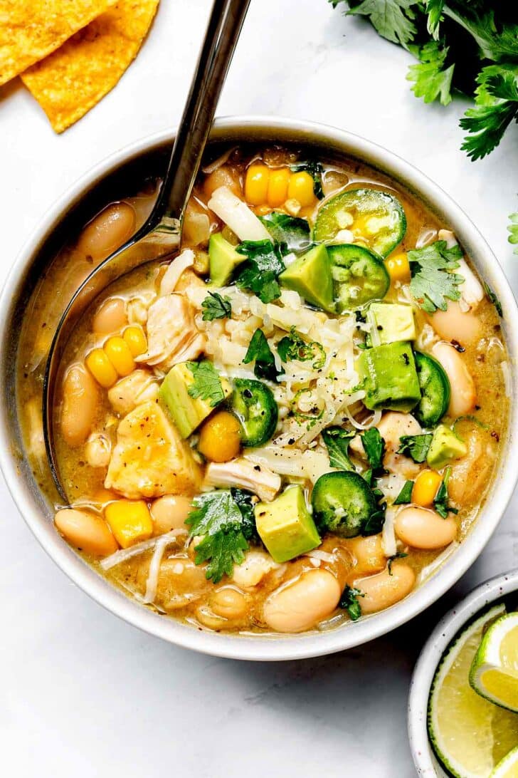 White Bean Chicken Chili in bowl with spoon