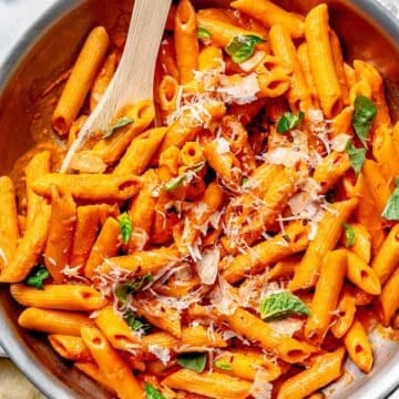 Creamy sauce and pasta for Penne alla Vodka recipe in skillet