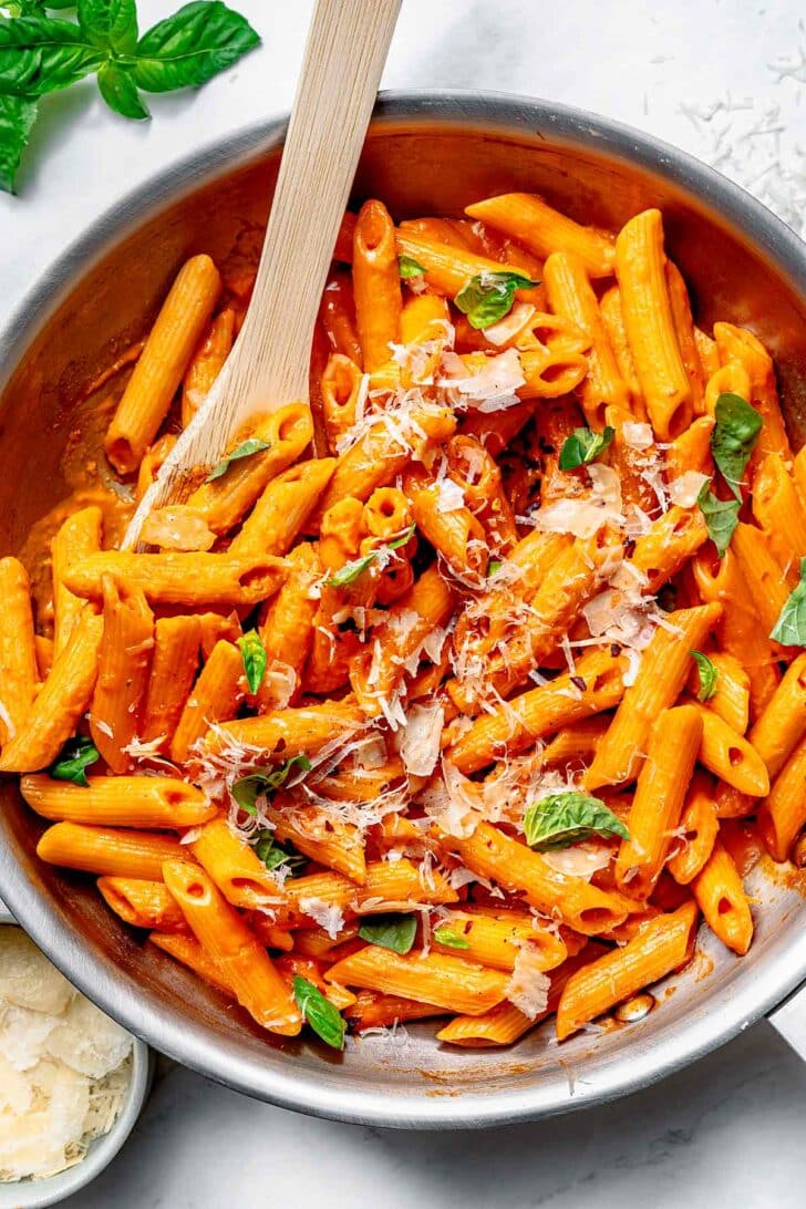 Creamy sauce and pasta for Penne alla Vodka recipe in skillet