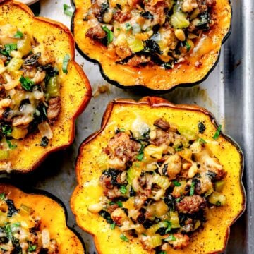 Sausage Stuffed Acorn Squash on baking sheet