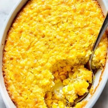 Corn Pudding in baking dish with spoon