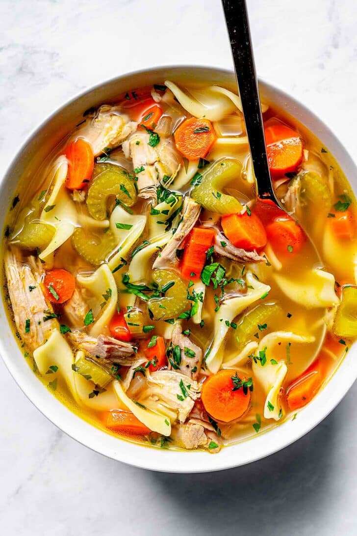 Turkey Noodle Soup recipe in bowl with spoon