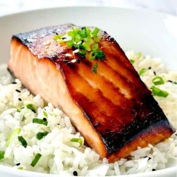 Miso Salmon on bed of rice on plate foodiecrush.com