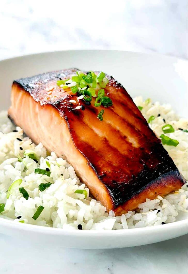 Miso Salmon on bed of rice on plate foodiecrush.com 