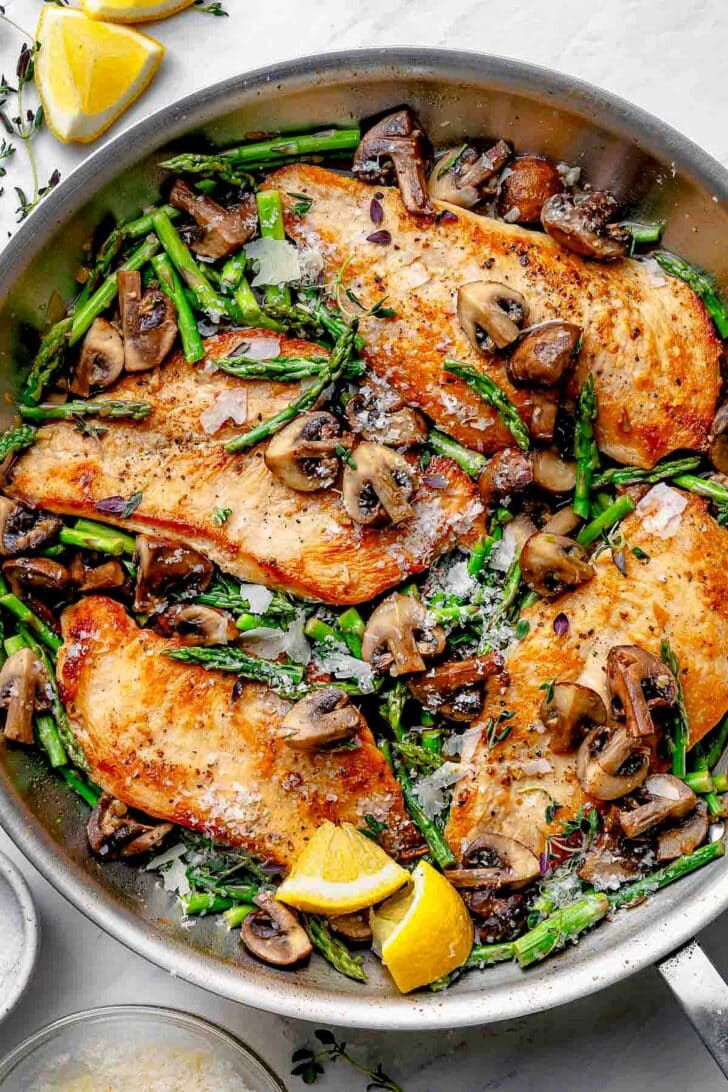Chicken with Asparagus and Mushrooms in skillet
