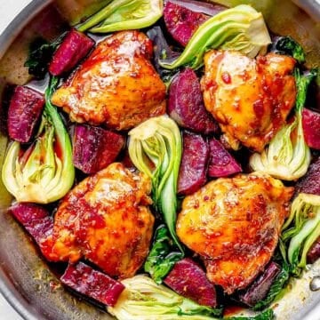 Sweet Soy Glazed Chicken Thighs with Japanese Sweet Potatoes in skillet