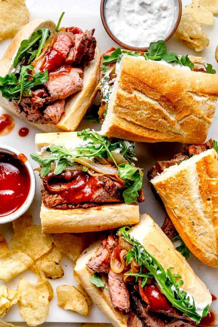 Grilled Tri Tip Sandwiches with potato chips and sauces