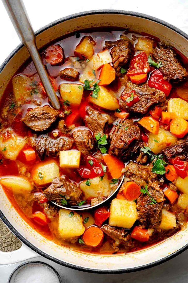 Hungarian Goulash in pot with ladle
