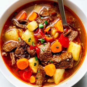 Hungarian Goulash in bowl with spoon