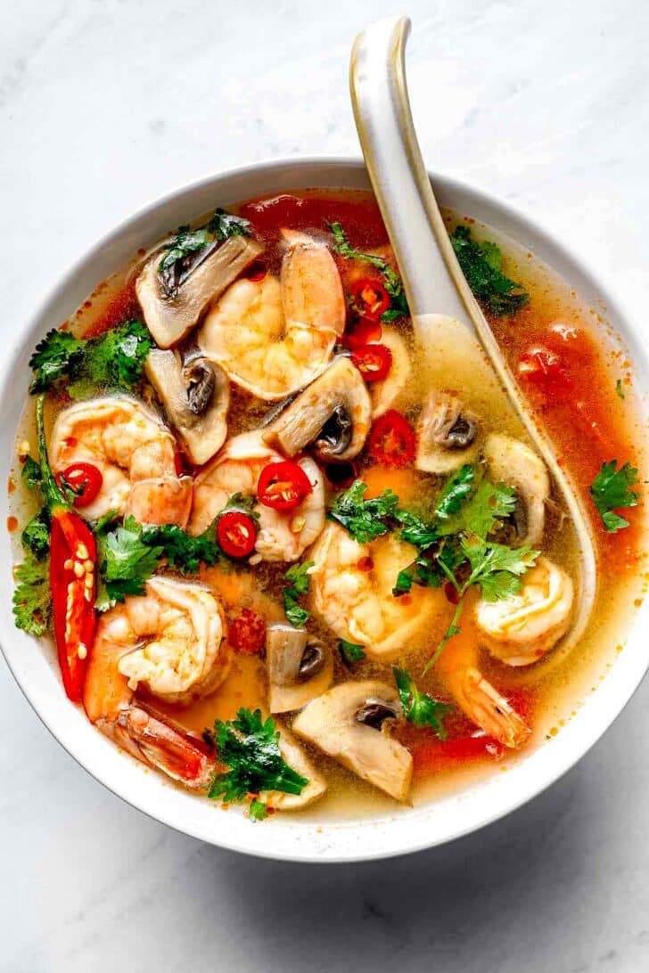 Tom Yum Goong Thai Shrimp Soup recipe in a bowl with spoon